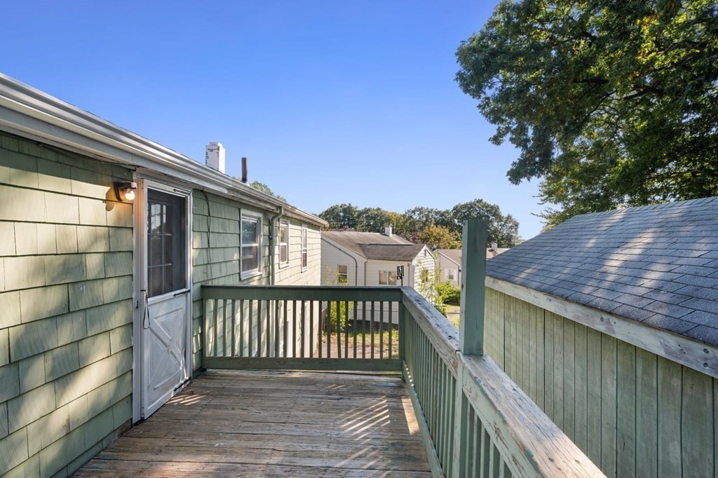 16 Blueview Road Boston, MA 02132 - Photo 30 of 33 a view of a balcony with wooden fence and floor