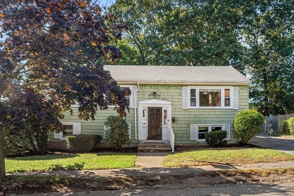 16 Blueview Road Boston, MA 02132 - Photo 32 of 33 a view of a house with yard and tree in front of it