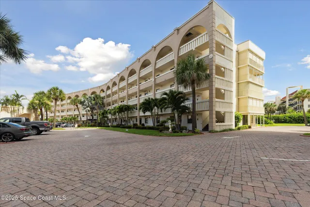 a view of a building with a street