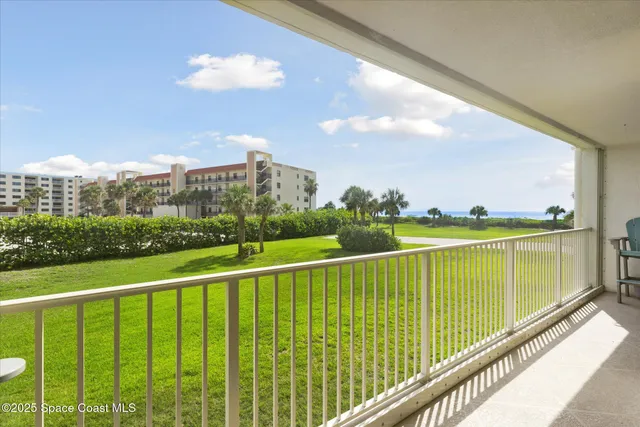 a view of city and a balcony