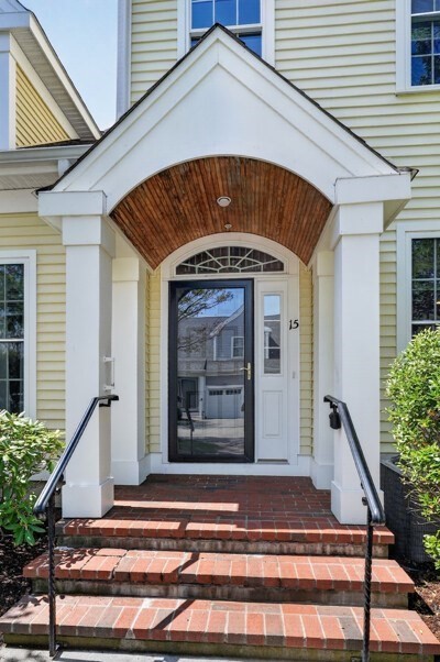 a front view of a house with a garage