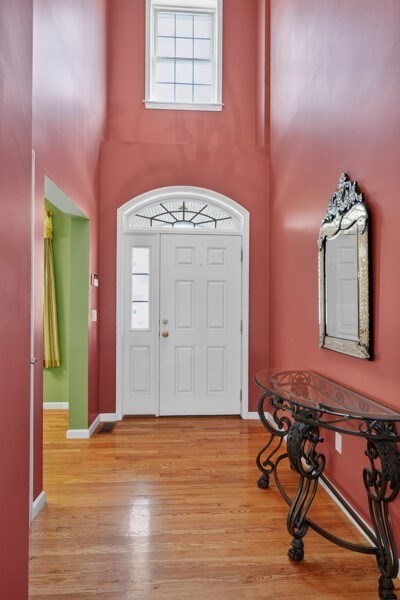 15 Hastings Road, Unit 15 Hudson, MA 01749 - Photo 29 of 40 a view of livingroom with hardwood floor and hallway