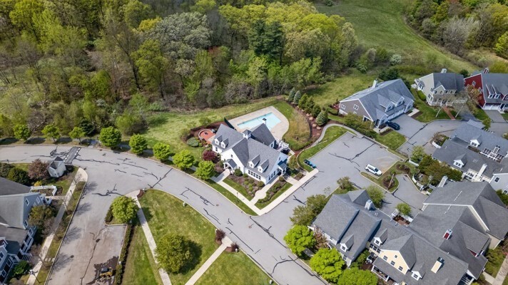15 Hastings Road, Unit 15 Hudson, MA 01749 - Photo 40 of 40 an aerial view of a house with a yard