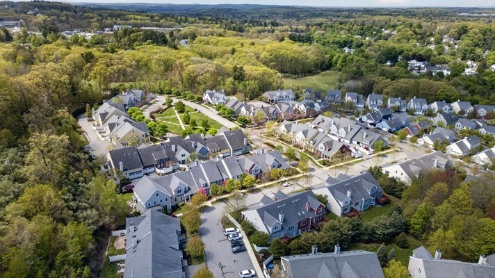 15 Hastings Road, Unit 15 Hudson, MA 01749 - Photo 5 of 40 an aerial view of residential houses with outdoor space