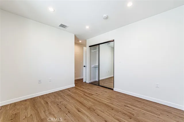 a bathroom with a toilet sink and shower