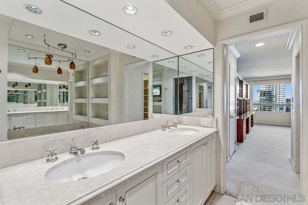 700 Front Street, Unit 2105 San Diego, CA 92101 - Photo 12 of 28 a spacious bathroom with a sink double vanity