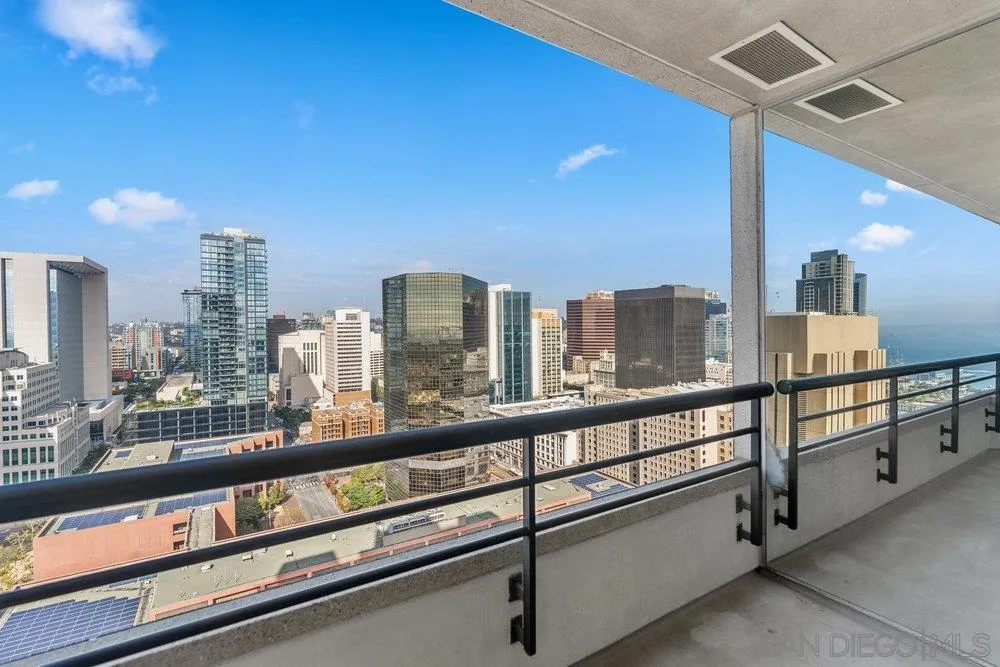 700 Front Street, Unit 2105 San Diego, CA 92101 - Photo 2 of 28 a view of a city from a balcony with furniture