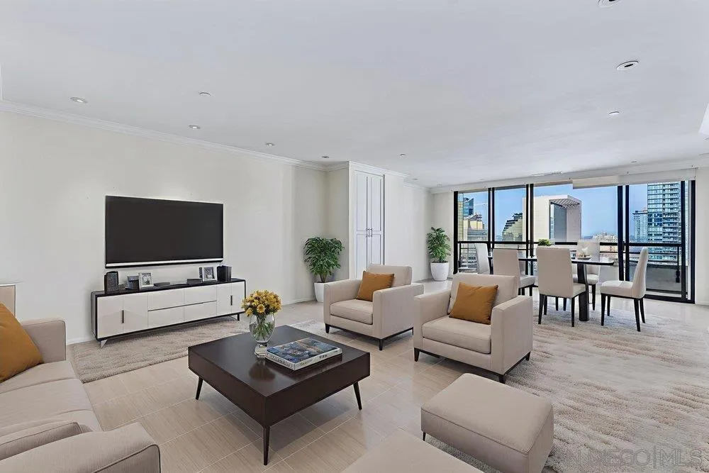 700 Front Street, Unit 2105 San Diego, CA 92101 - Photo 6 of 28 a living room with furniture and a flat screen tv