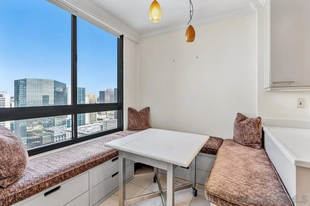 700 Front Street, Unit 2105 San Diego, CA 92101 - Photo 10 of 28 a bedroom with a bed and large window