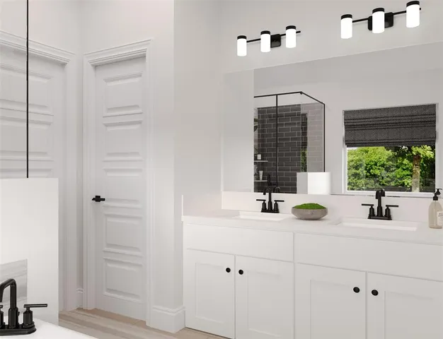 a bathroom with a sink and a window