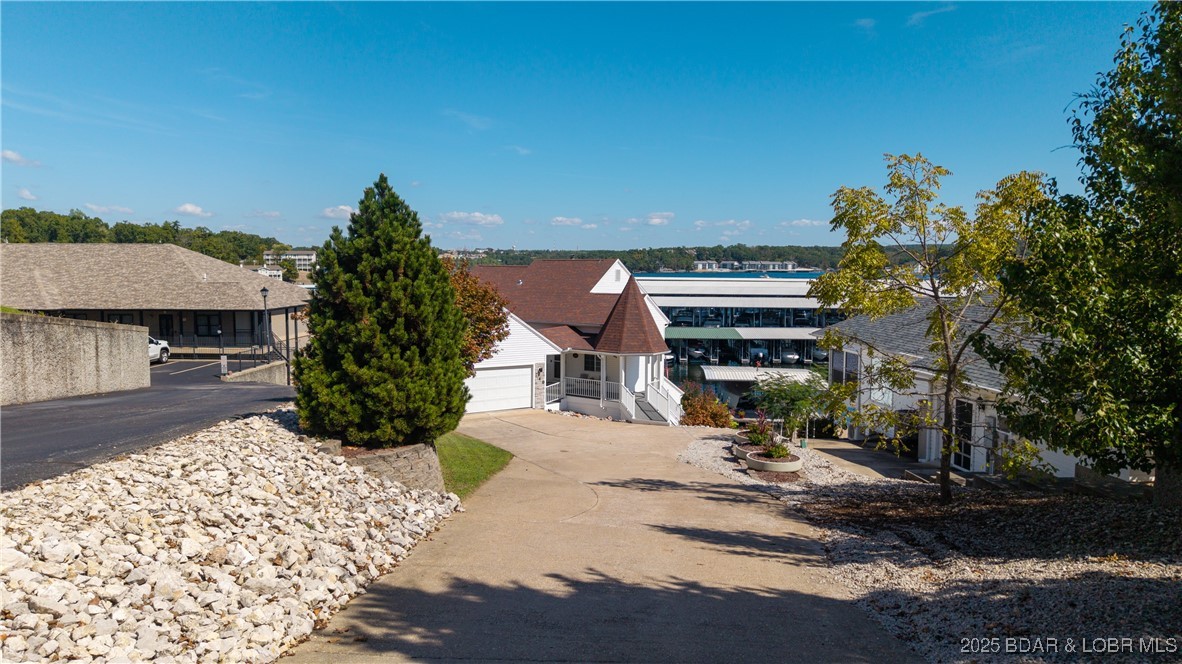 740 Malibu Road Osage Beach, MO 65065 - Photo 38 of 42 Gentle slope driveway with plenty of parking
