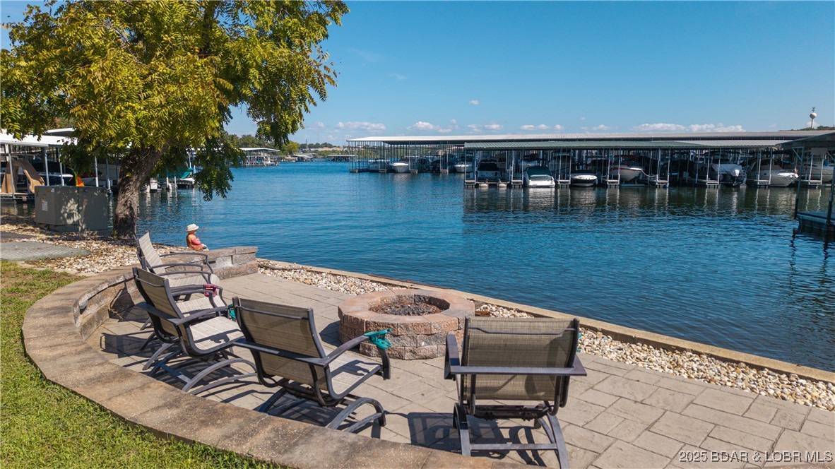 740 Malibu Road Osage Beach, MO 65065 - Photo 4 of 42 Flat firepit area right off the lakefrontage