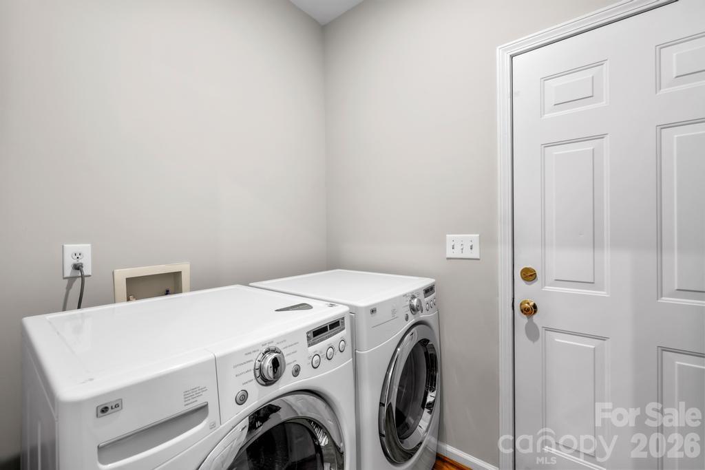 17028 Hampton Trace Road Huntersville, NC 28078 - Photo 17 of 41 a utility room with dryer and washer