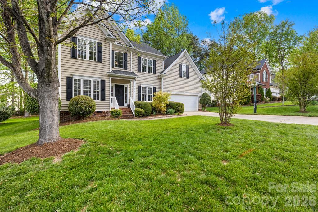 17028 Hampton Trace Road Huntersville, NC 28078 - Photo 36 of 41 a front view of a house with garden and tree