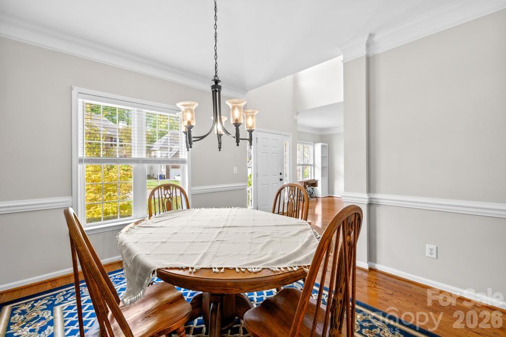 17028 Hampton Trace Road Huntersville, NC 28078 - Photo 5 of 41 a view of a dining room with furniture window and outside view