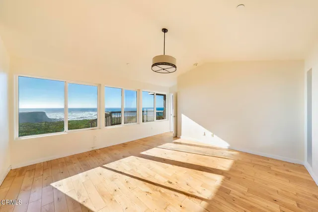 a bathroom with a sink a mirror and a toilet