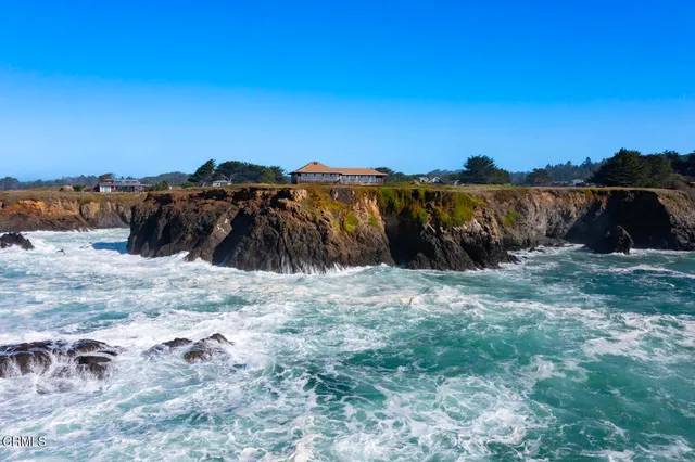 a view of a lake with a mountain