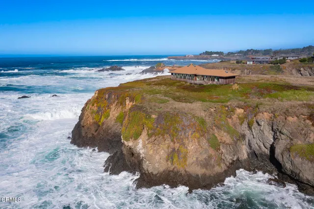 a view of a lake with a beach