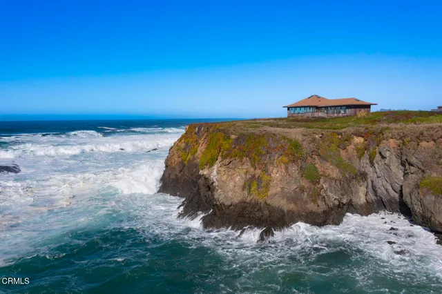 a view of ocean with city