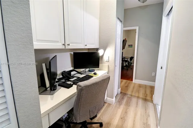a view of workspace with wooden floor washer and dryer