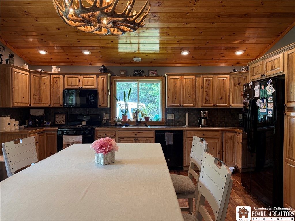 9039 Kidder Road Mina, NY 14781 - Photo 23 of 48 Great room eating and kitchen area