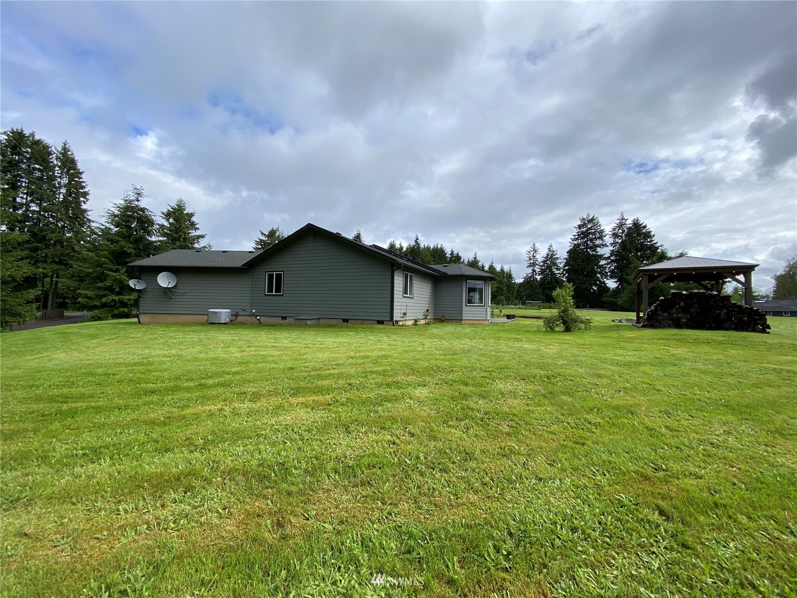 105 Cristler Road Chehalis, WA 98532 - Photo 3 of 37 a front view of house with yard and green space