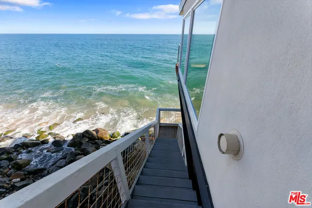 a view of a deck with wooden floor