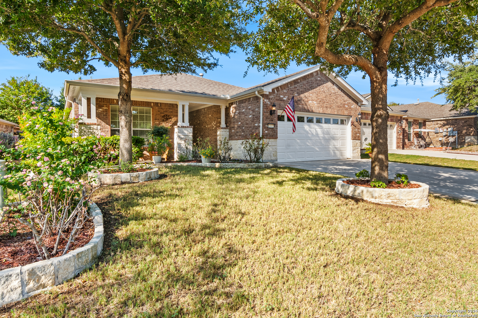 12422 Modena Bay San Antonio, TX 78253 - Photo 1 of 1 a front view of a house with a yard
