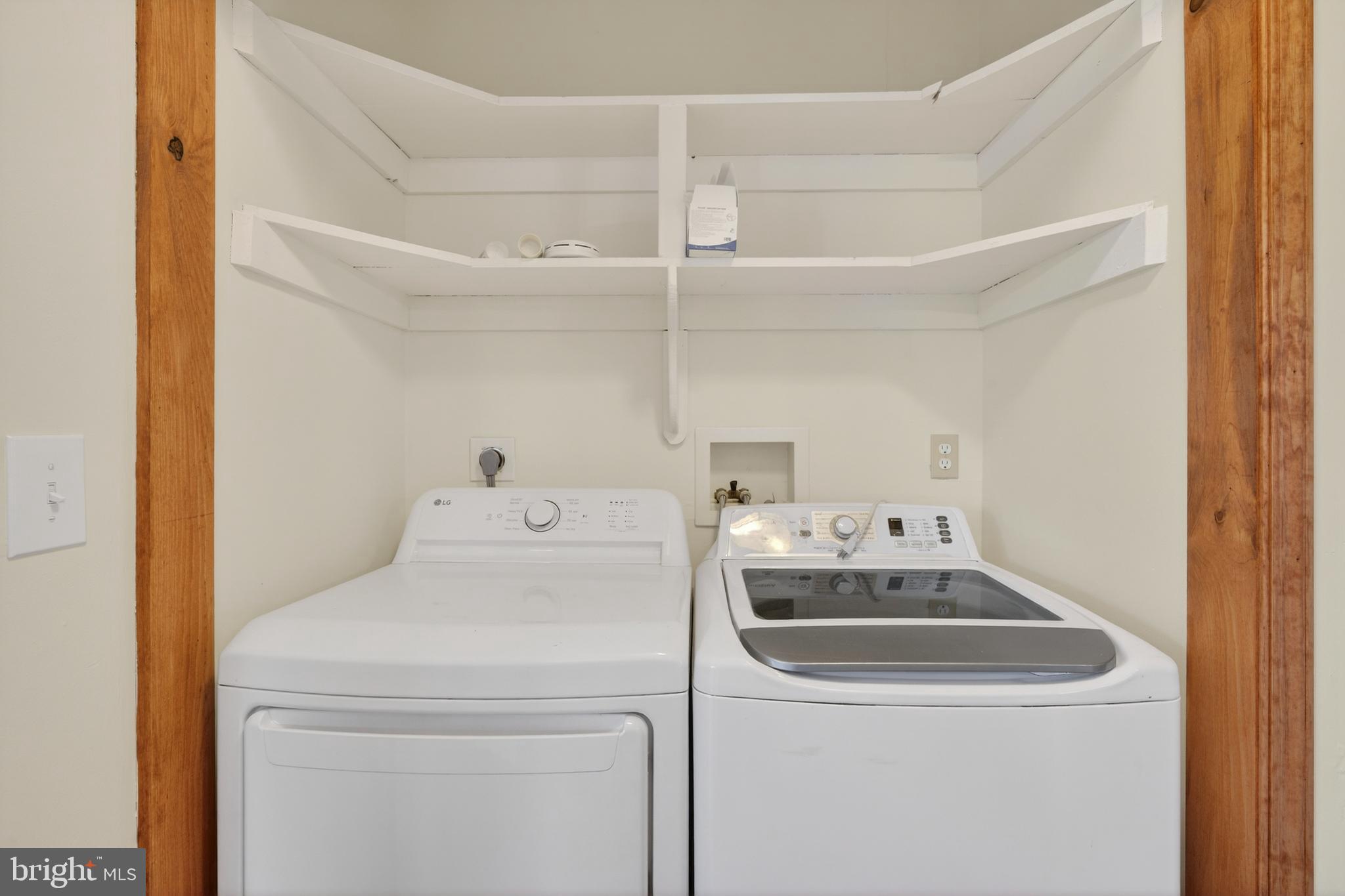4037 1st Street Chesapeake Beach, MD 20732 - Photo 12 of 26 a utility room with dryer and washer
