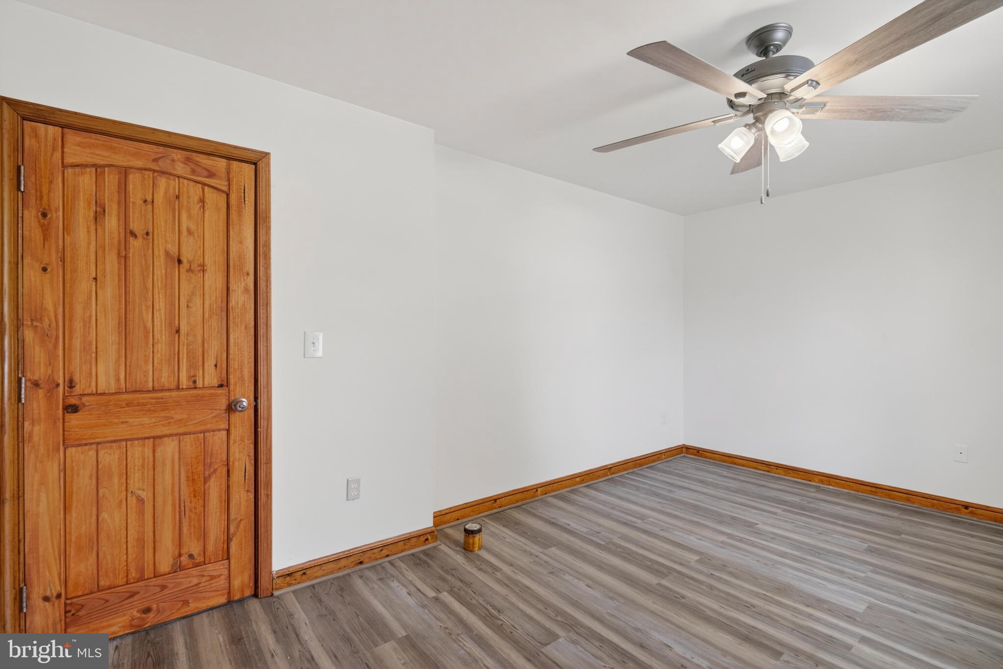 4037 1st Street Chesapeake Beach, MD 20732 - Photo 18 of 26 wooden floor in an empty room