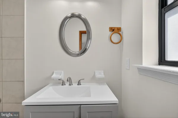 a bathroom with a sink and a bathtub