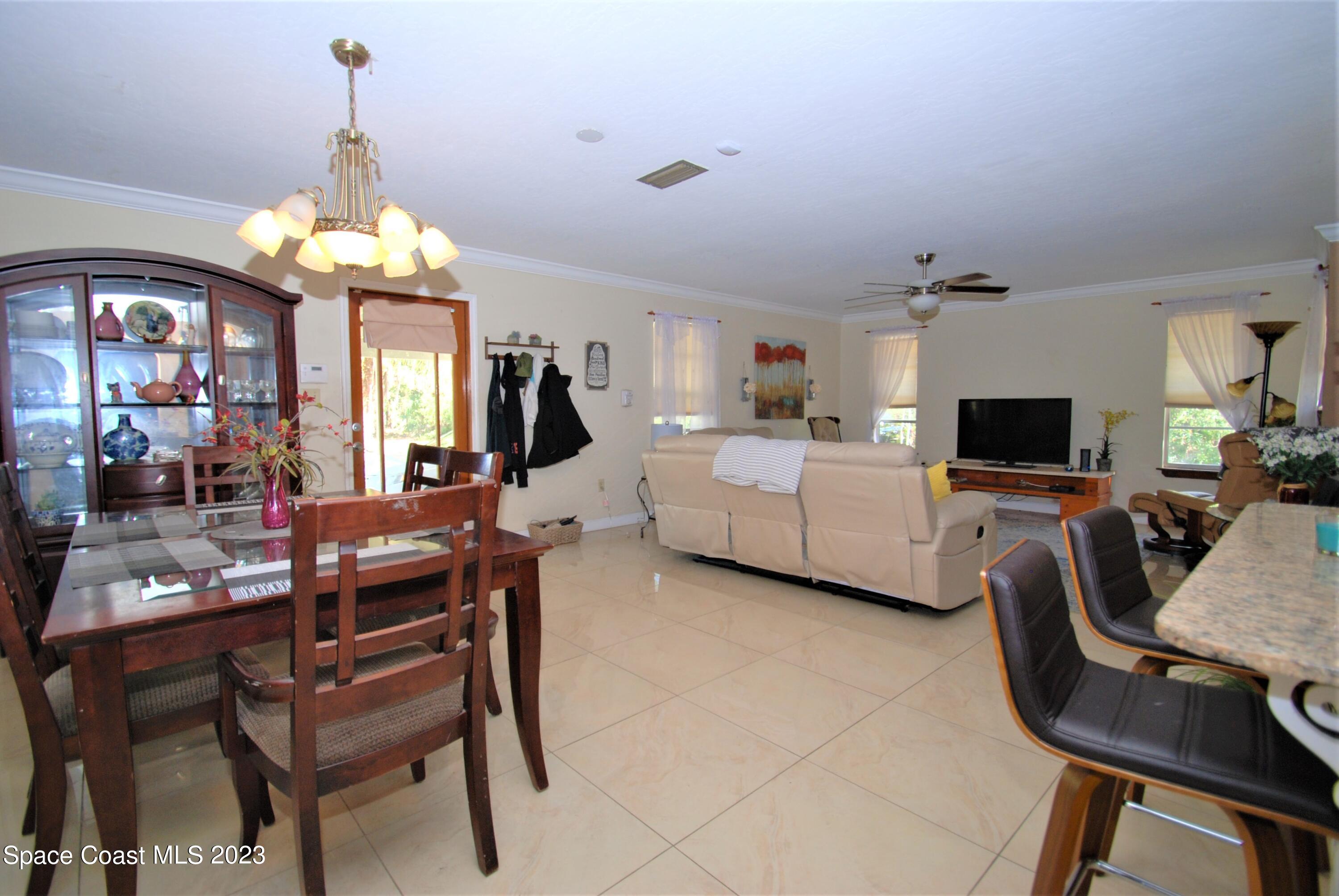 2450 Ski Lane Malabar, FL 32950 - Photo 5 of 23 Dining and Living Area