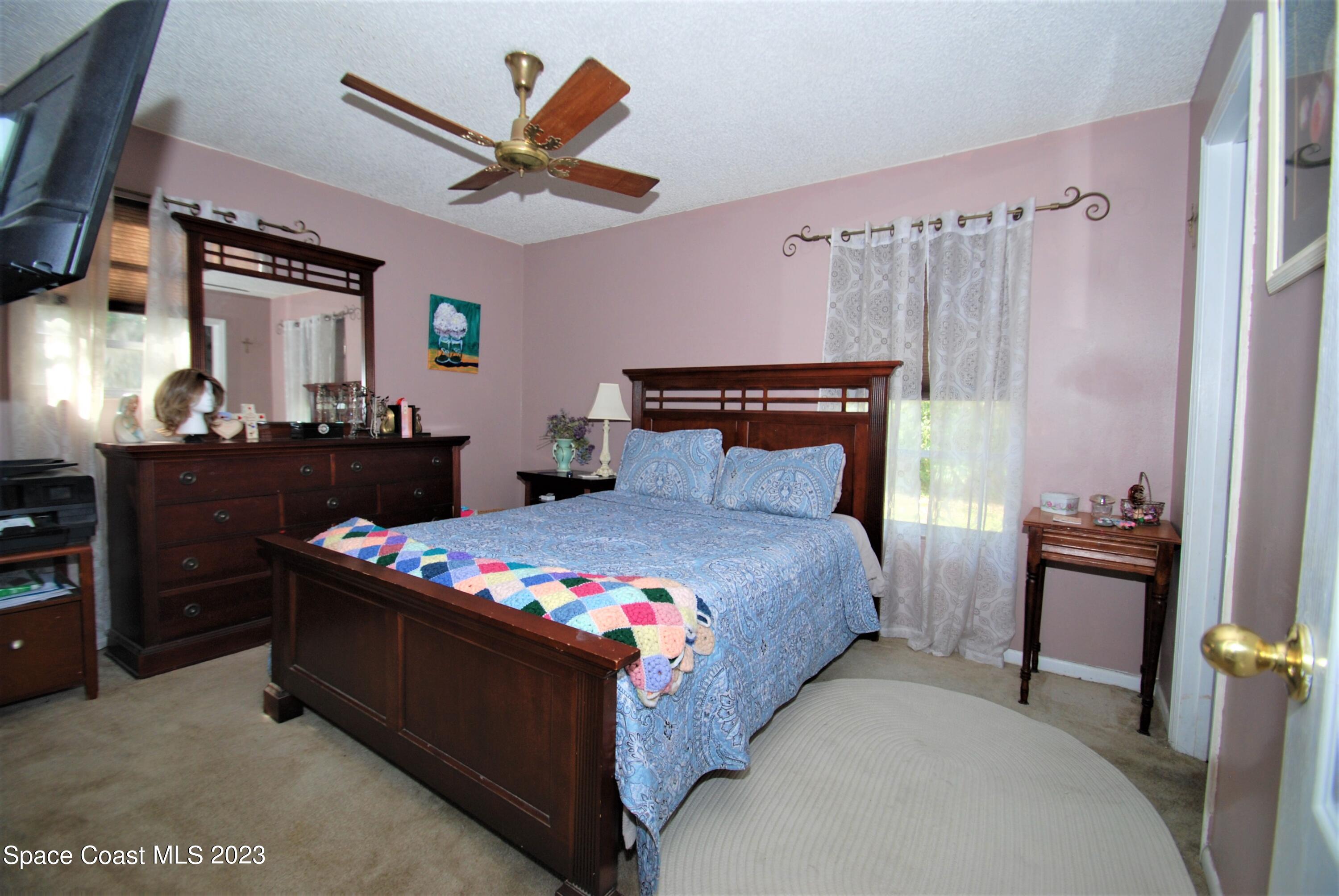 2450 Ski Lane Malabar, FL 32950 - Photo 7 of 23 Primary Bedroom