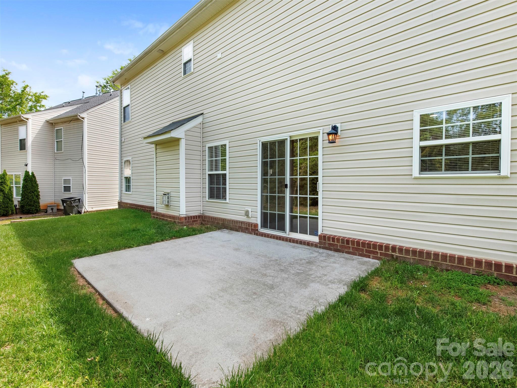 6507 Hermsley Road Charlotte, NC 28278 - Photo 22 of 40 a view of a house with a yard and garage