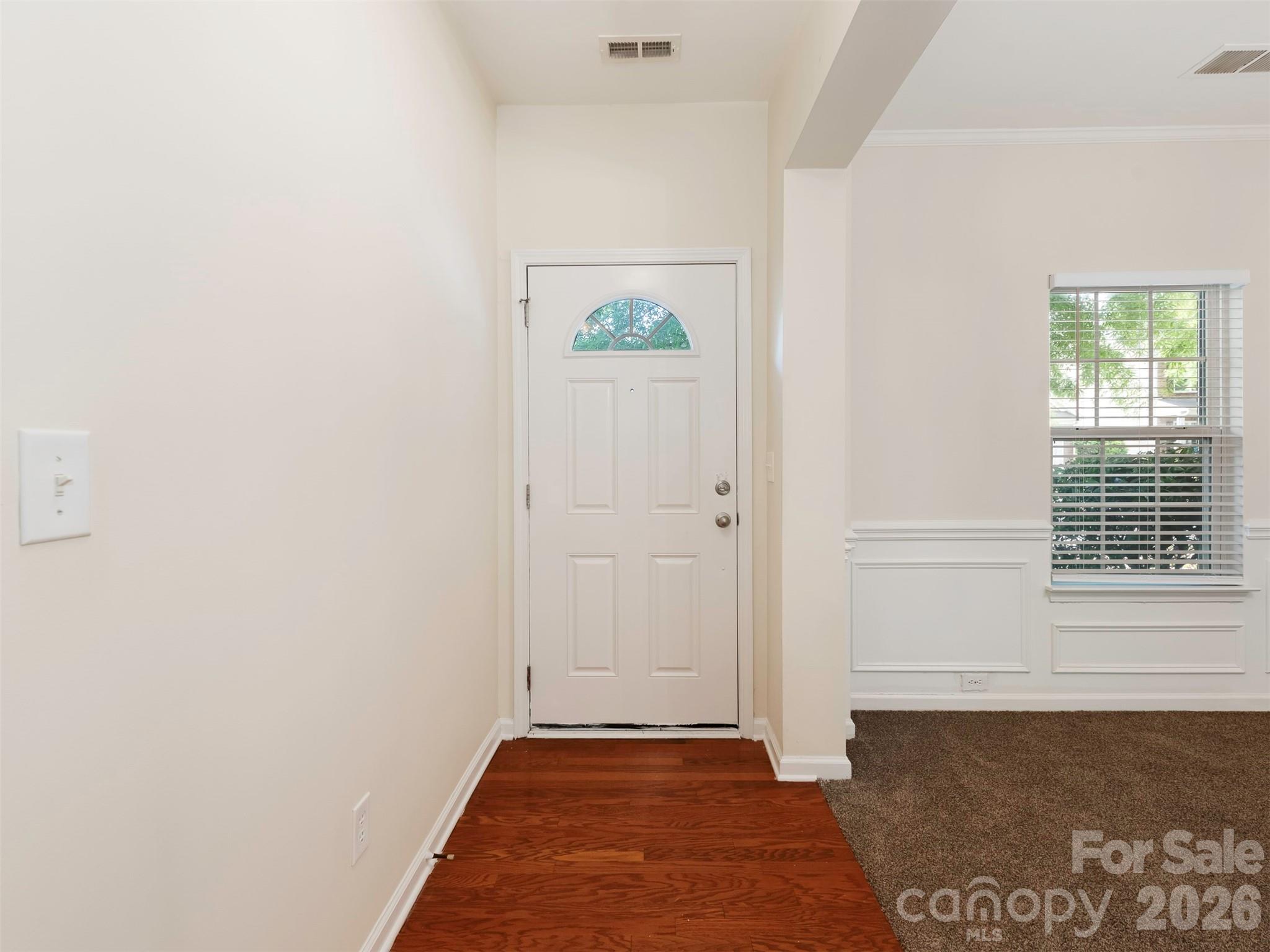 6507 Hermsley Road Charlotte, NC 28278 - Photo 3 of 40 a view of an empty room with a window