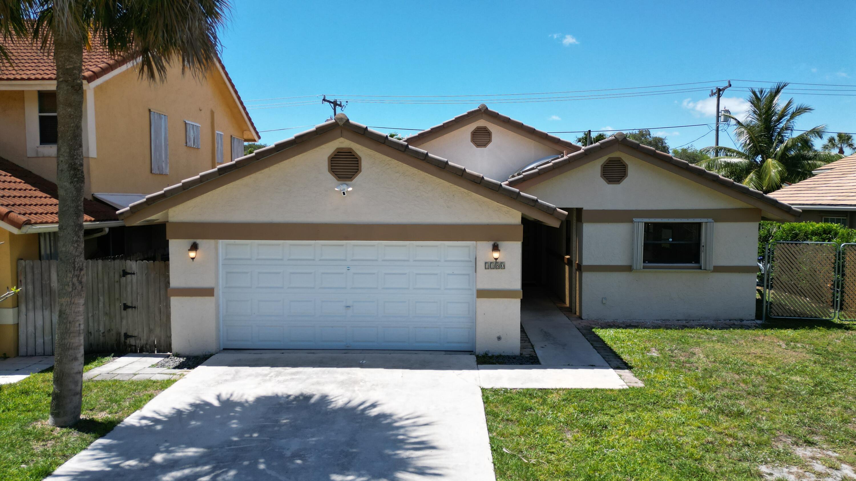 1180 Southwest 18th Street Boca Raton, FL 33486 - Photo 1 of 24 Front of the house