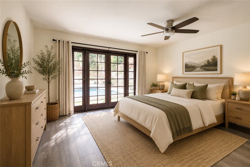 25342 Hugo Road Laguna Niguel, CA 92677 - Photo 27 of 36 Primary Bedroom with French Doors looking out to the swimming pool - Virually Staged