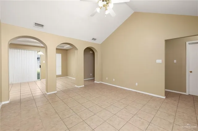 wooden floor with white walls