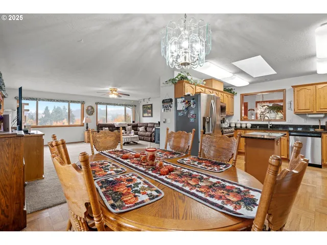 a very nice looking dining room with furniture