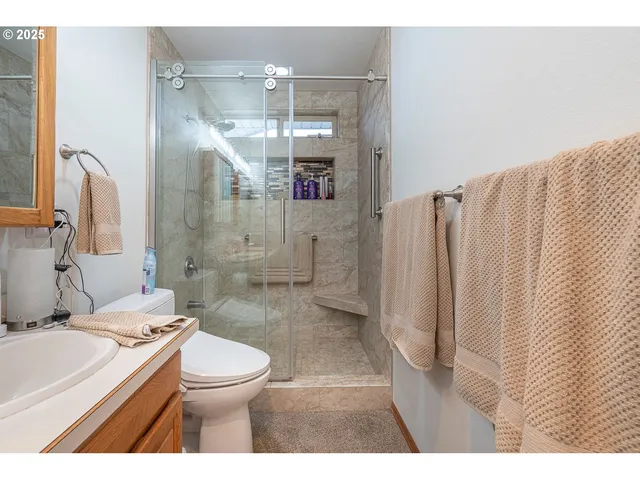 a view of a livingroom with a furniture and window