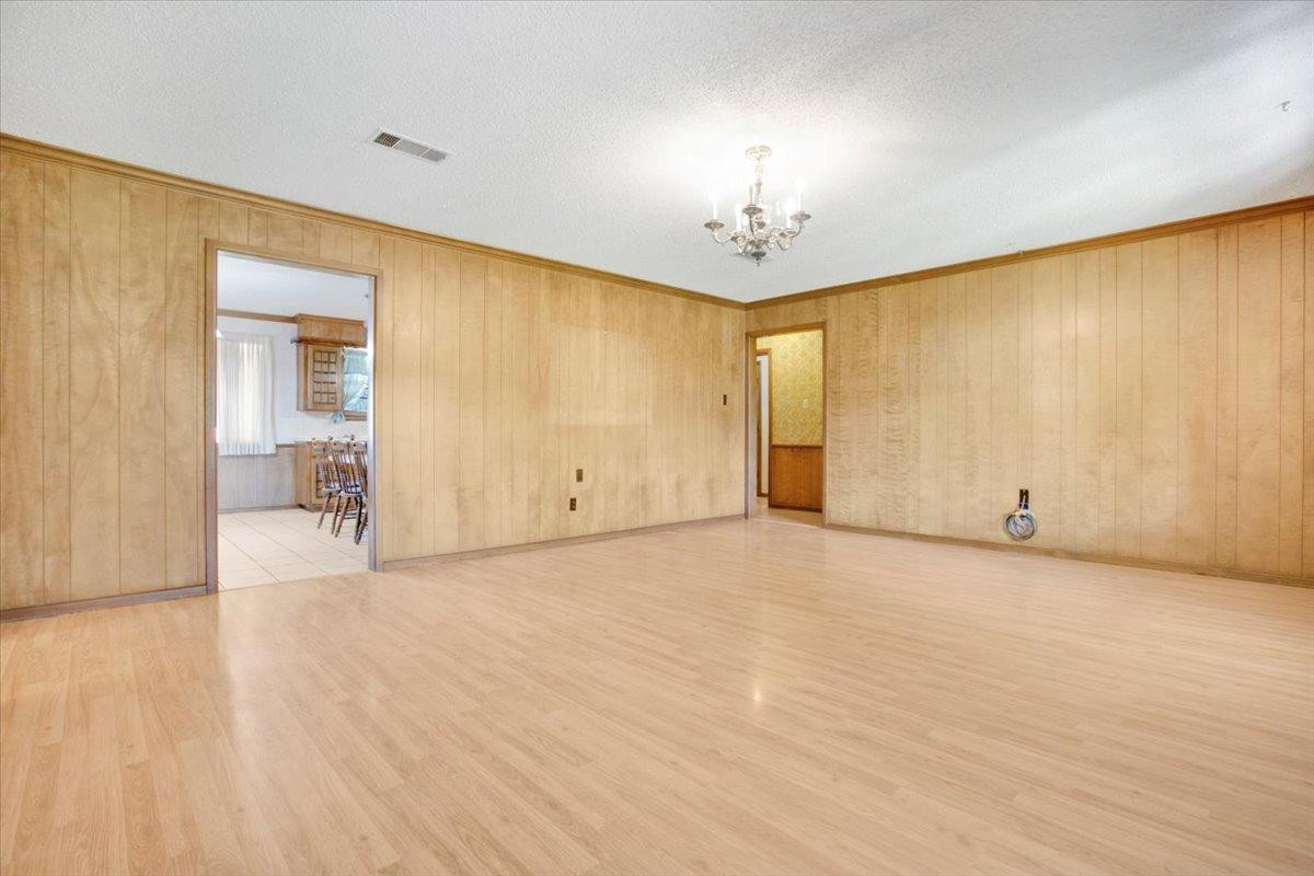 205 Smith Avenue New Home, TX 79381 - Photo 11 of 27 a view of an empty room with a window