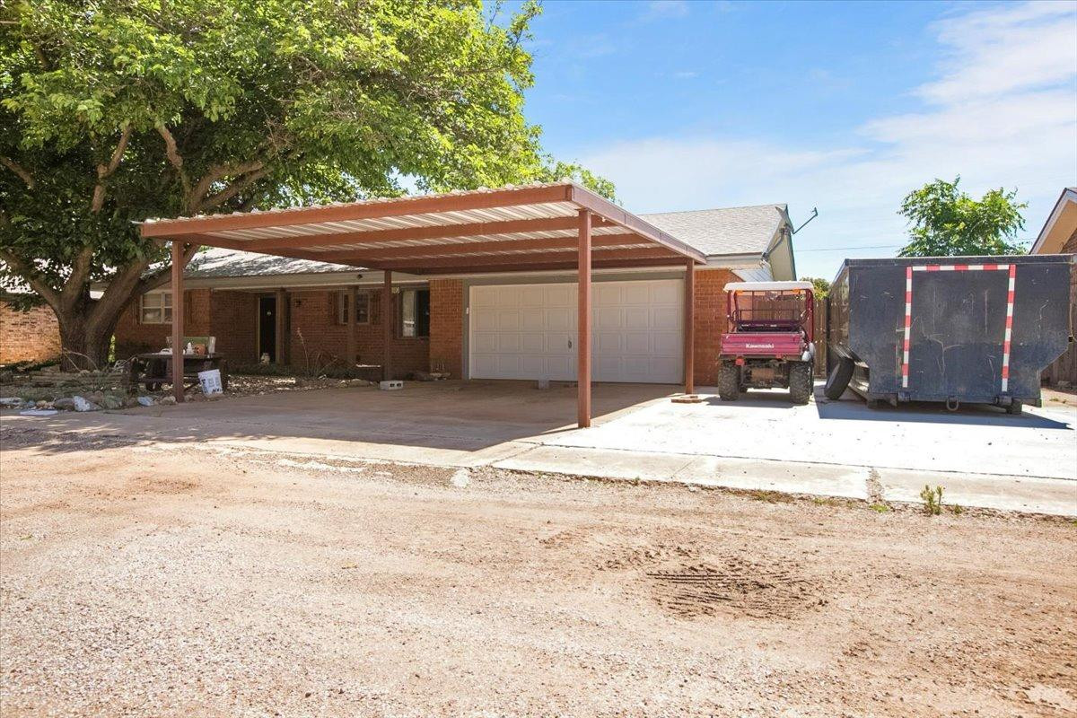 205 Smith Avenue New Home, TX 79381 - Photo 2 of 27 a view of a backyard