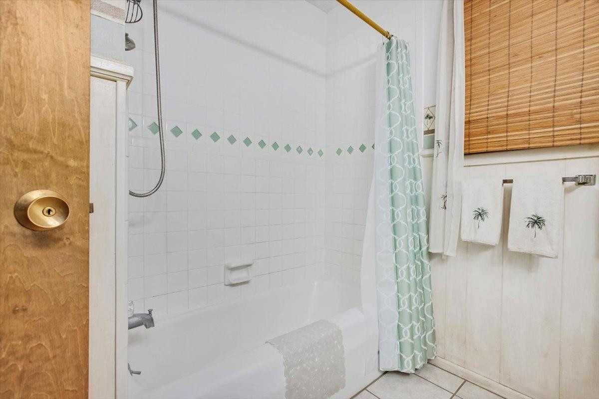 205 Smith Avenue New Home, TX 79381 - Photo 21 of 27 a bathroom with a shower