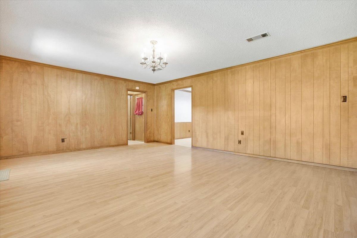 205 Smith Avenue New Home, TX 79381 - Photo 10 of 27 a view of an empty room with a window