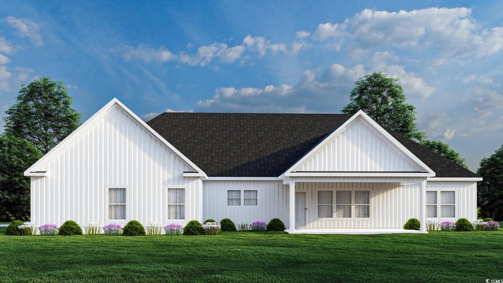 2176 Pettus Way Surfside Beach, SC 29575 - Photo 4 of 5 Exterior space with covered porch and a lawn