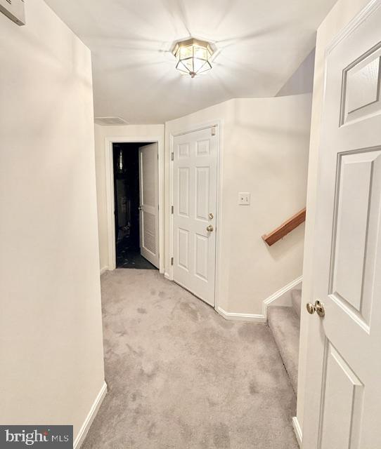 45572 Whitcomb Square Sterling, VA 20166 - Photo 23 of 32 Welcoming hallway with soft lighting.