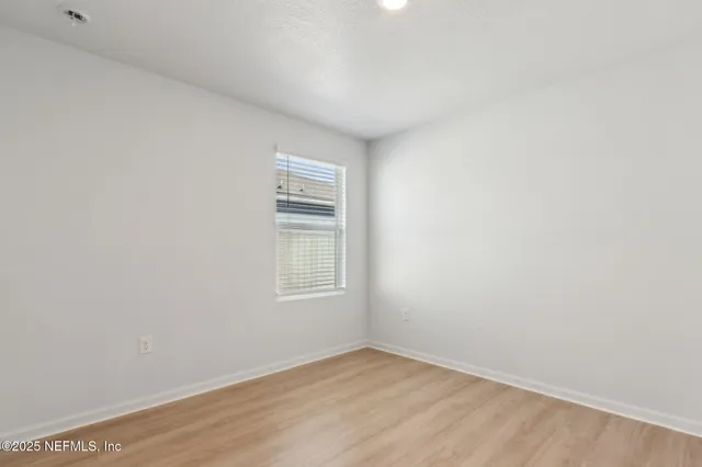 a view of a lake with a big yard