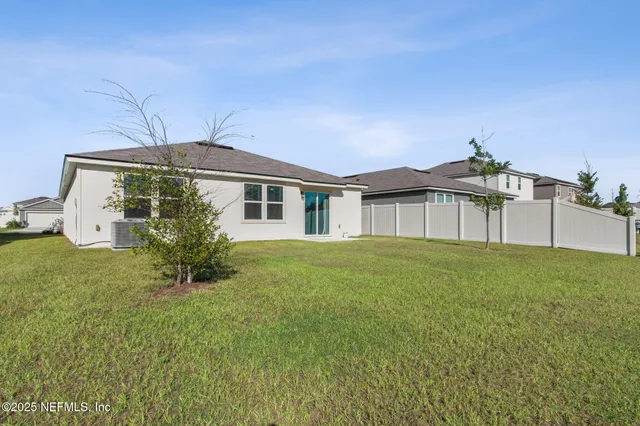 a view of a street in front of the house