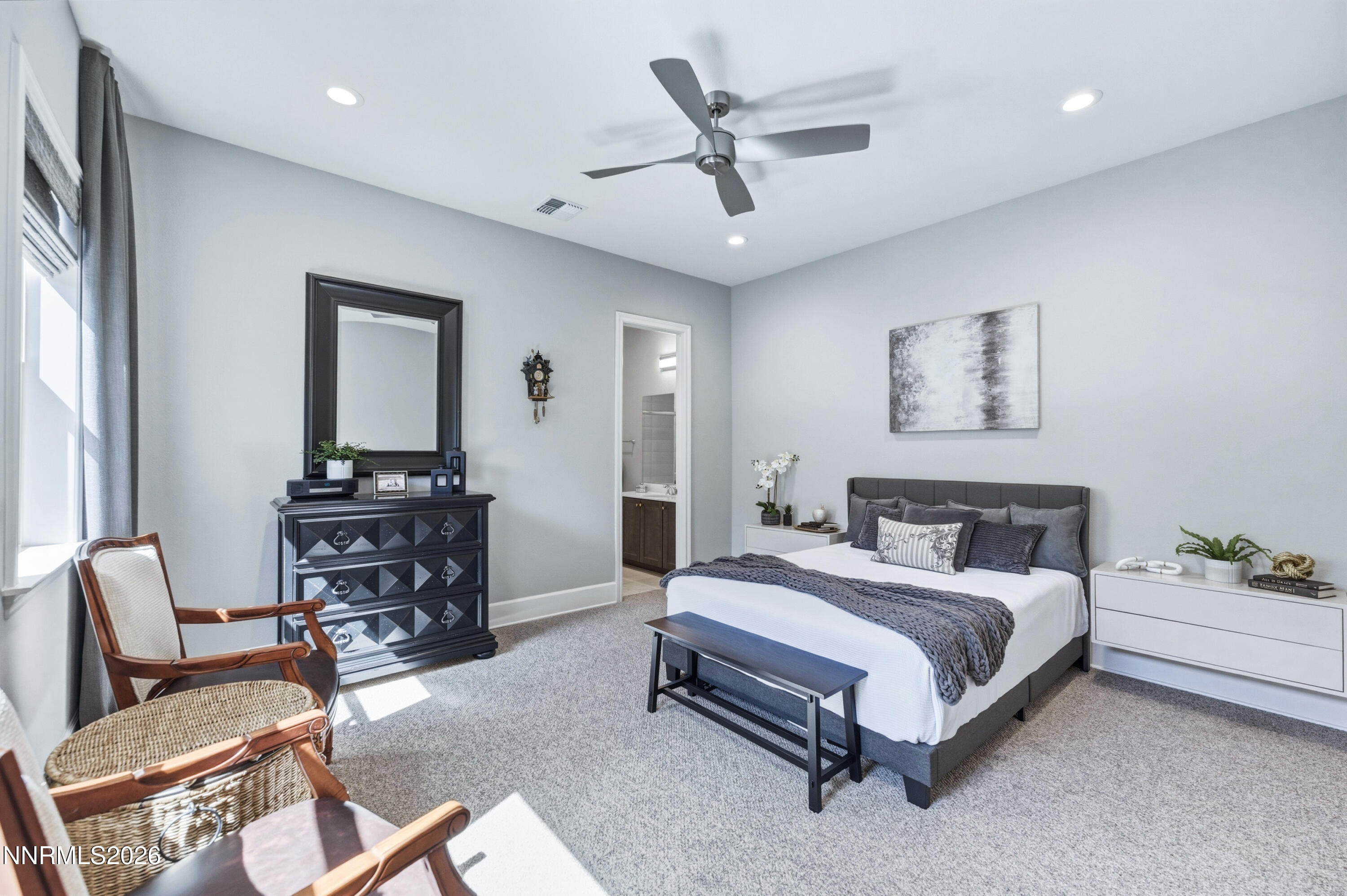 9028 Iron Sky Court Reno, NV 89523 - Photo 15 of 36 a bedroom with a bed and furniture