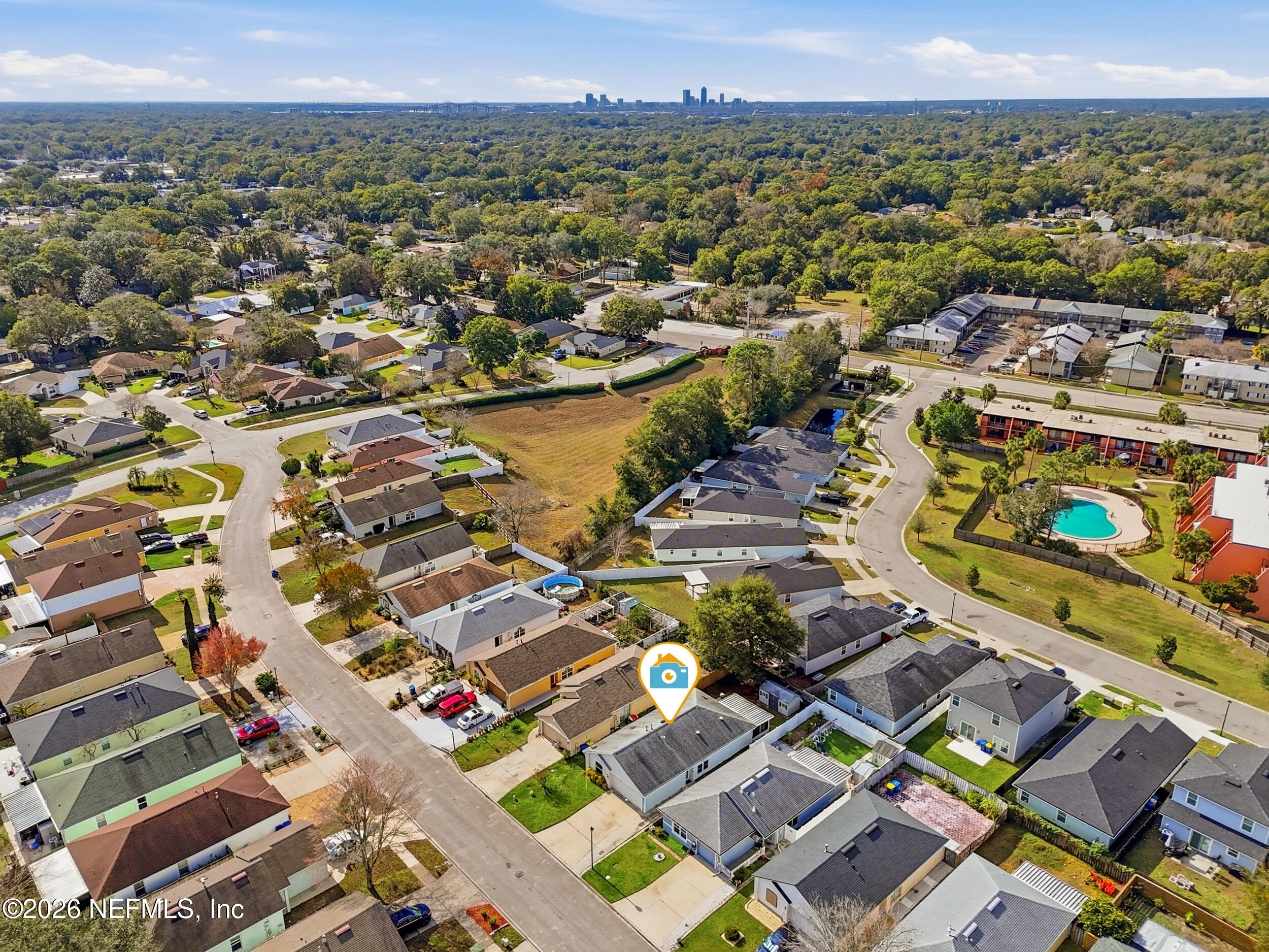 3380 Net Court Jacksonville, FL 32277 - Photo 2 of 20 an aerial view of residential houses with outdoor space